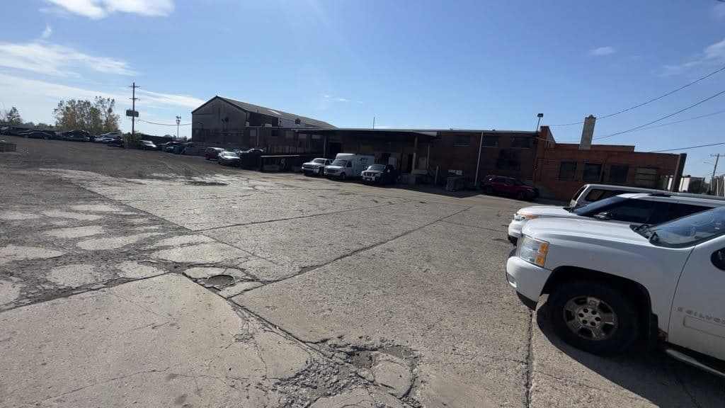 Entrance and lot of the Detroit Junk Car Recycling facility